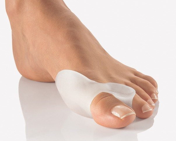 Использование фиксатора для большого пальца ноги Фиксатор большого пальца ноги